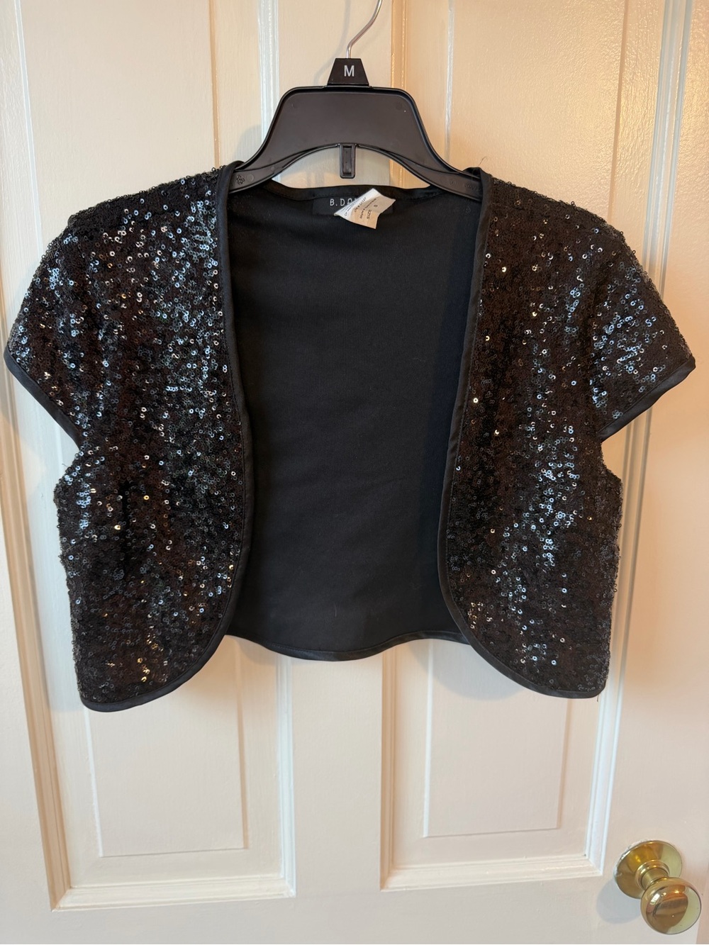 B. Darlin Black Short Sleeve Sequin Shrug